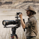 Chris Schmid with his Sony camera and Sachtler flowtech tripod